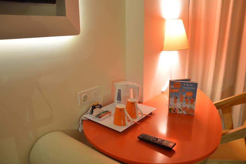 Harris Hotel Raya 庫塔 客房 照片