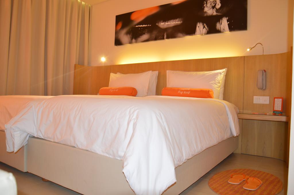 Harris Hotel Raya 庫塔 客房 照片